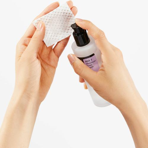 COSRX AHA 7 Whitehead Power Liquid, 100 ml - exfoliant formulat cu acid glicolic si apa de mere, care contribuie la imbunatatirea tonusului si texturii pielii si la minimizarea aparitiei punctelor albe si a rugozitatii