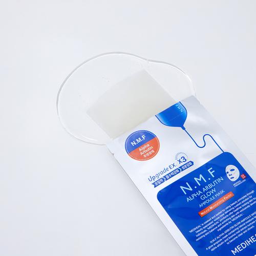 MEDIHEAL N.M.F Alpha Arbutin Glow Ampoule Sheet Mask - masca de fata formulata cu Alpha Arbutin si niacinamida, care contribuie la iluminarea si uniformizarea tenului si la metinerea confortului pielii - 27 ml