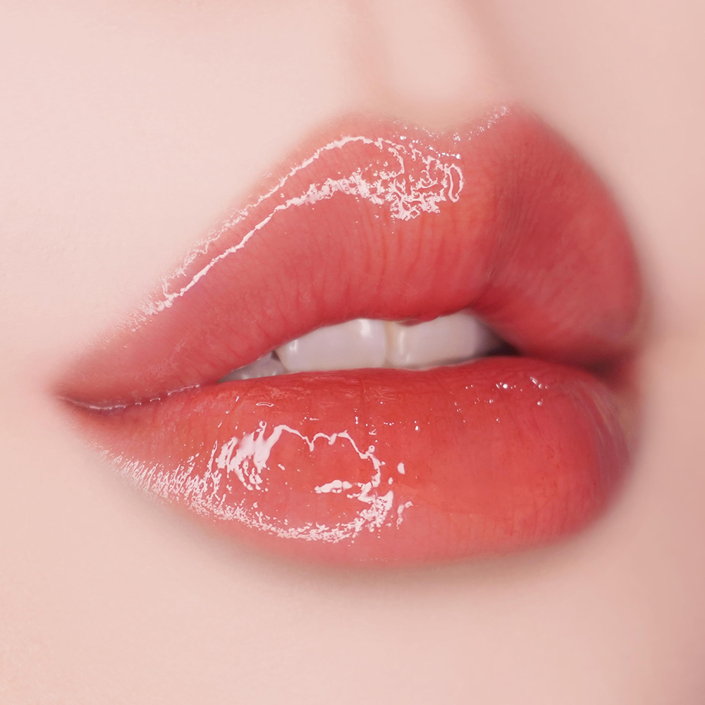 UNLEASHIA Popcorn Syrup Lip Plumper Luciu de buze No. 4 Honey Grapefruit - hidratare si volum, 3.8 gr