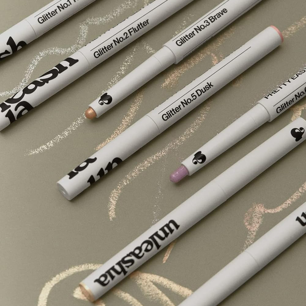 UNLEASHIA Pretty Easy Glitter Stick fard de pleoape No. 1 Thrilled - luminozitate si rezistenta, 0.7 gr