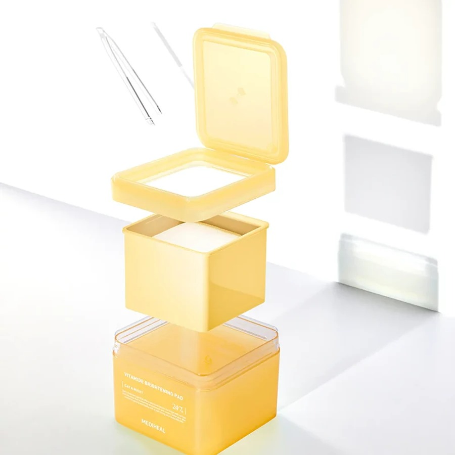 MEDIHEAL Vitamide Brightening Pad - toner de fata formulat cu niacinamida si apa de catina, care contribuie la iluminarea tenului si la uniformizarea aspectului pielii - 100 buc