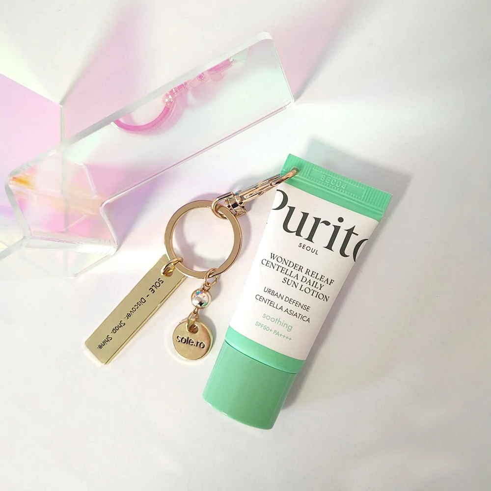 SPF TO GO - Breloc auriu premium + Purito Wonder Releaf Centella Daily Sun Lotion SPF 50+ PA++++ mini (15 ml) - editie limitata