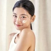 SPF TO GO - Breloc auriu premium + Purito Wonder Releaf Centella Daily Sun Lotion SPF 50+ PA++++ mini (15 ml) - editie limitata